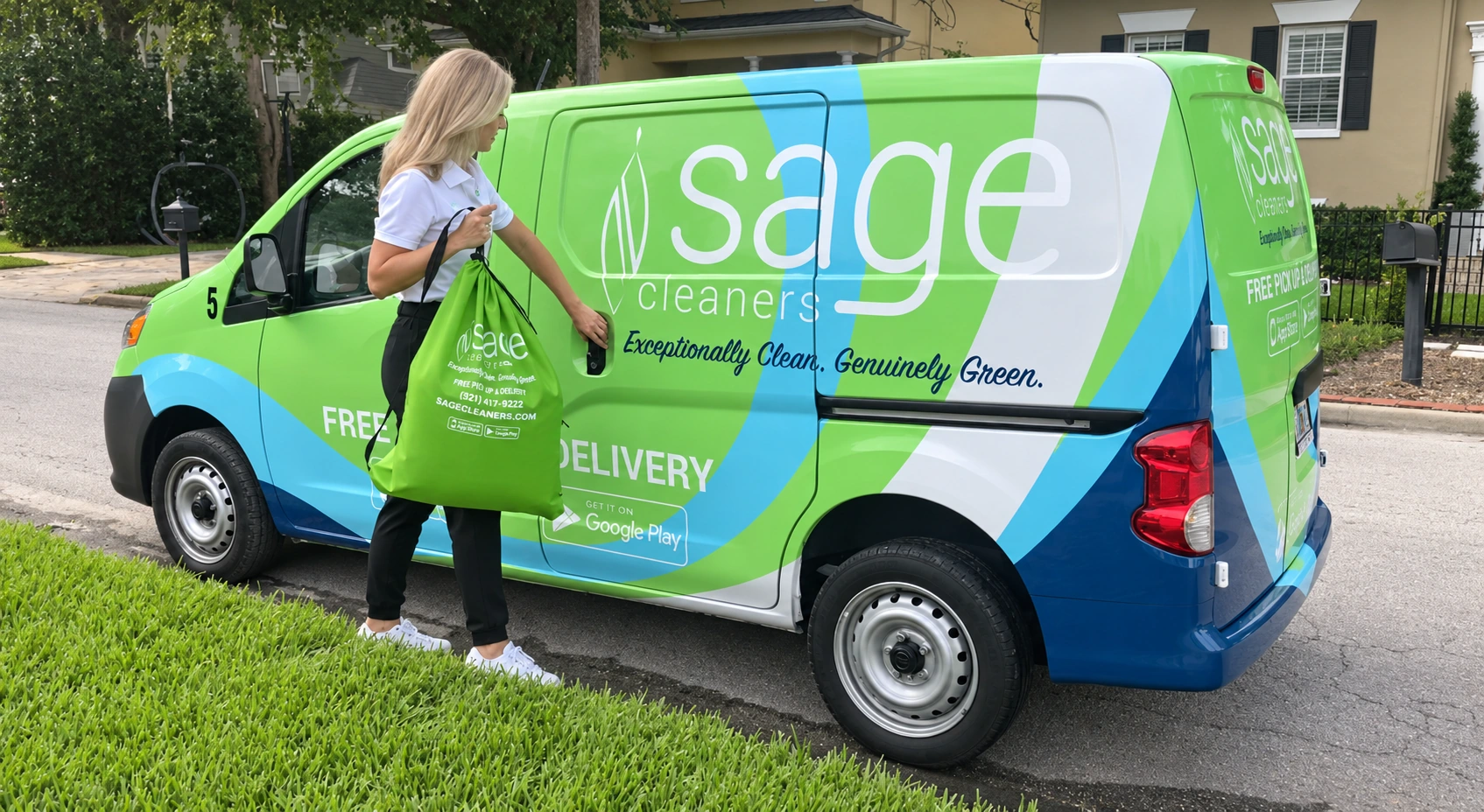 A Sage Cleaners team member collecting a garment bag beside the branded pickup and delivery van