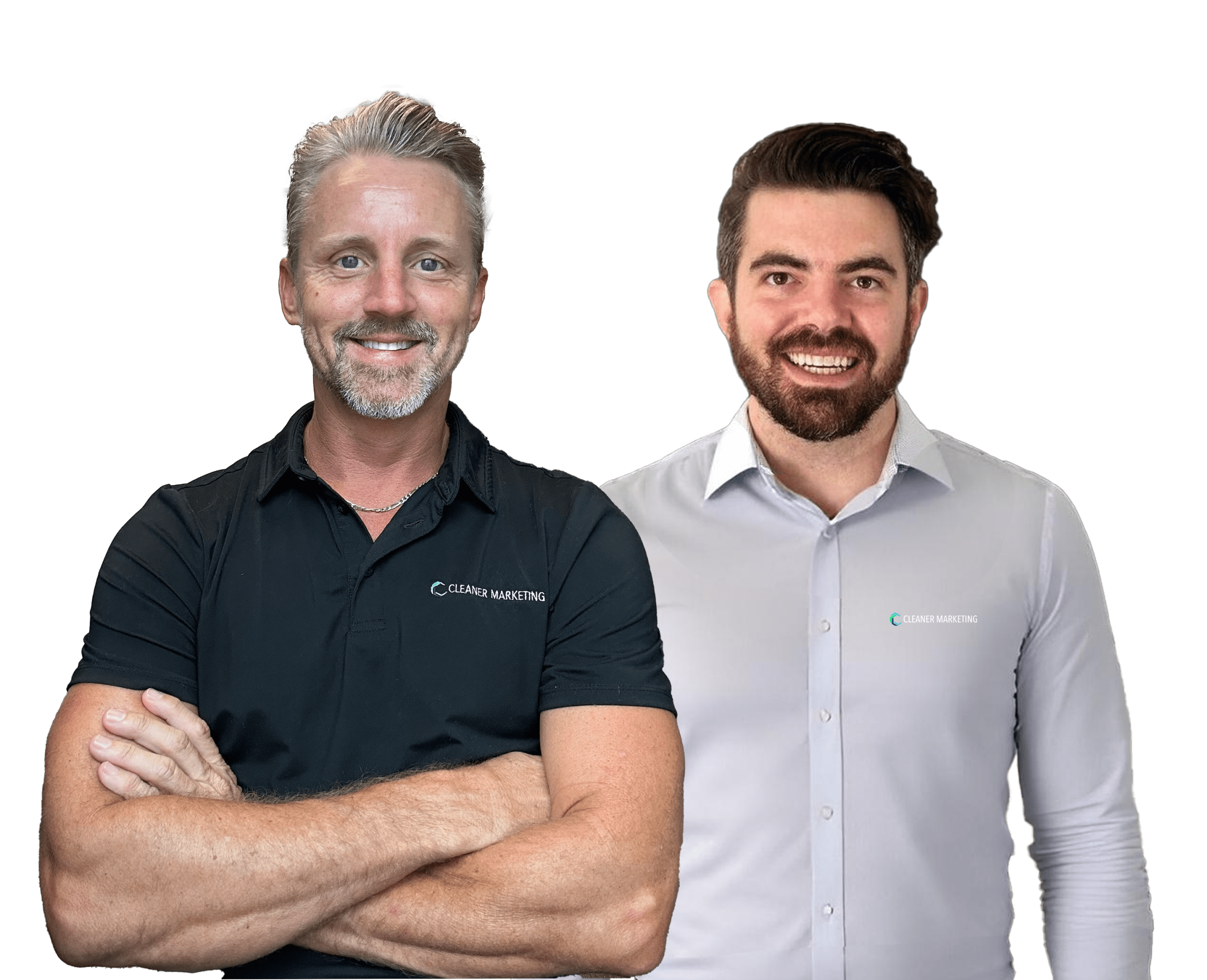 Two men stand side by side, both smiling. The man on the left wears a black polo shirt, and the man on the right wears a light-colored button-up shirt.