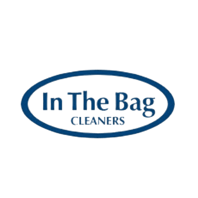 Blue "In The Bag Cleaners" logo with text inside an oval outline on a transparent background.