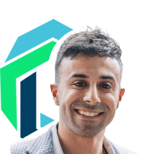 Smiling man in a light plaid jacket in front of a geometric blue and green logo on a white background.