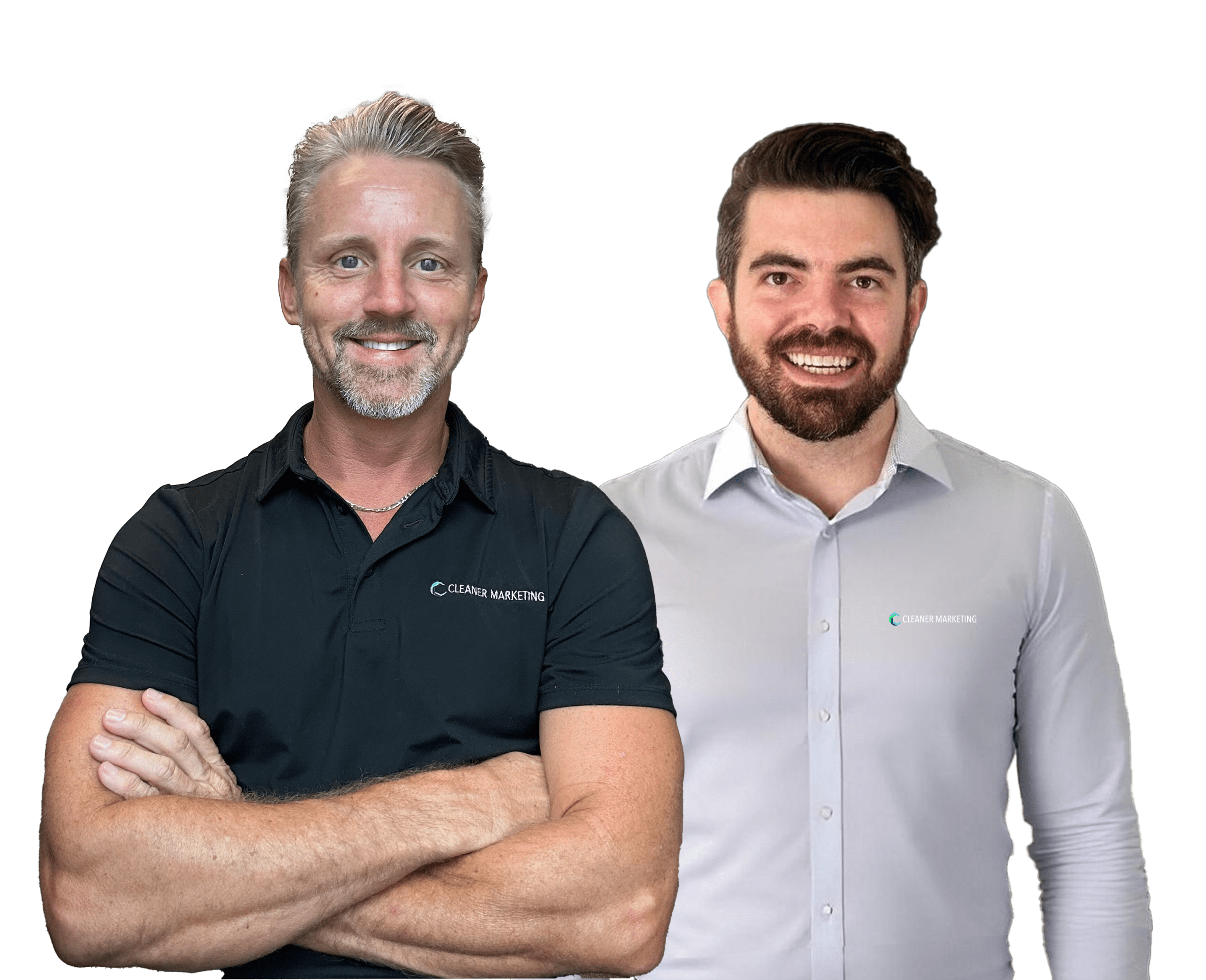 Two men stand side by side, both smiling. The man on the left wears a black polo shirt, and the man on the right wears a light-colored button-up shirt.