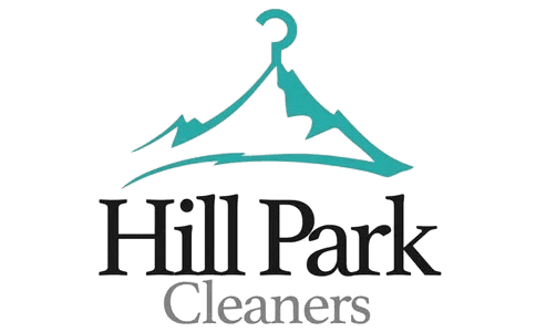 A teal clothes hanger shaped like a mountain above the text "Hill Park Cleaners" in black and gray.