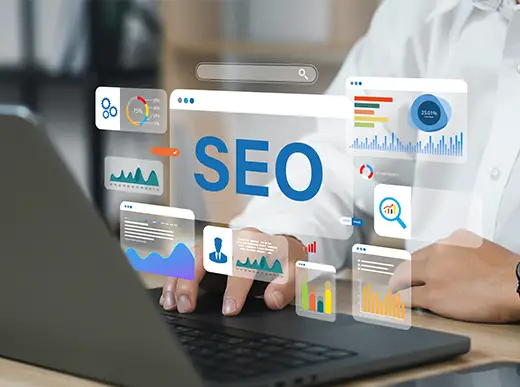 Person working on a laptop with virtual SEO-related analytics and data charts displayed on the screen.