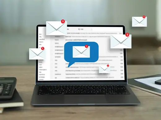 A laptop displaying an email inbox with multiple new email notification icons appearing around the screen.