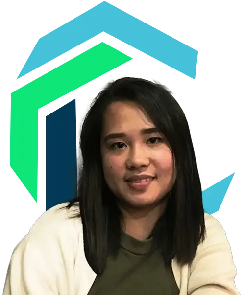 A woman with straight, dark hair sits in front of a graphic background featuring blue and green geometric shapes.