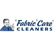 Logo for Fabric Care Cleaners featuring a smiling man in a suit pointing upward, with the company name in stylized blue text and small star accents.