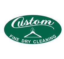 Green oval logo with the word "Custom" above a hanger icon, and the text "FINE DRY CLEANING" in white below the hanger.
